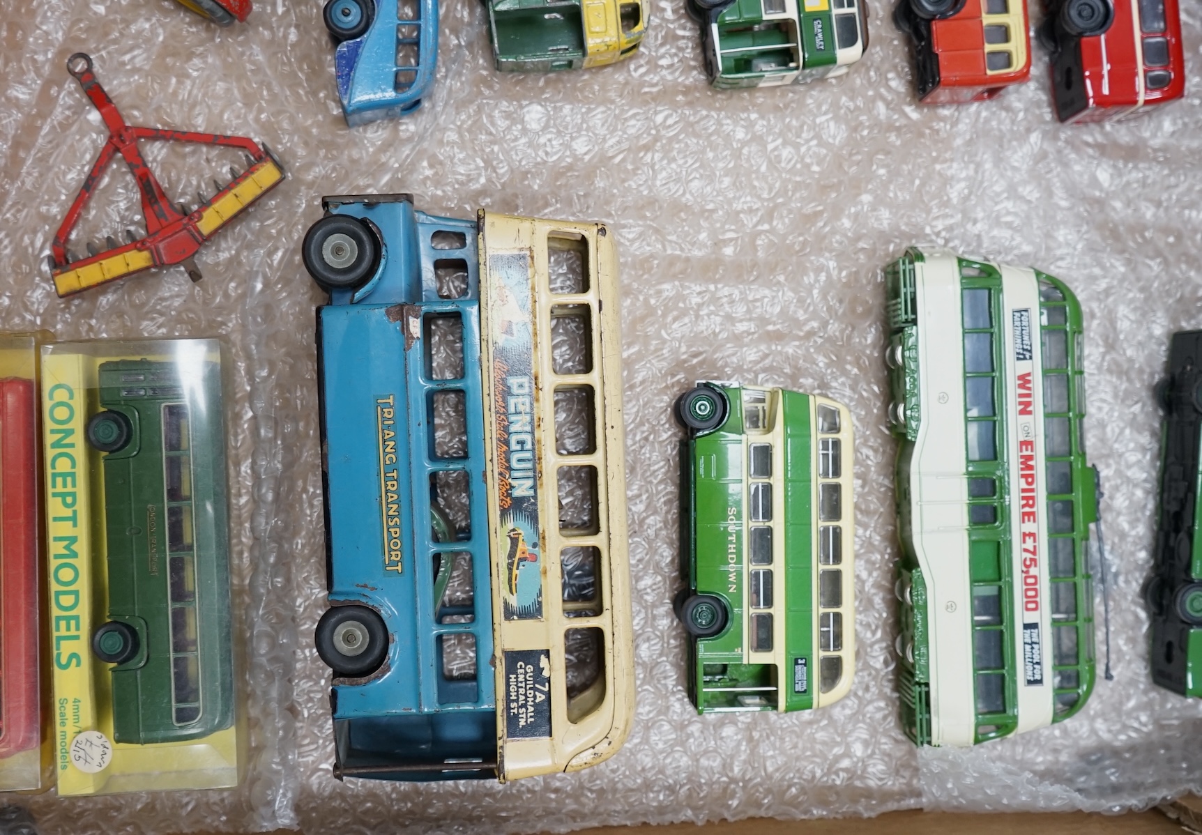 Sixteen models of buses and other vehicles by Dinky Toys, Corgi OOC, EFE, Concept Models etc. including a Tri-ang Minic clockwork tinplate double deck bus, an empty box for a Dinky Coventry Climax fork lift truck, etc. C